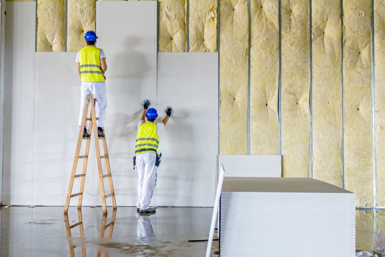 Fire-rated insulated partition wall installation